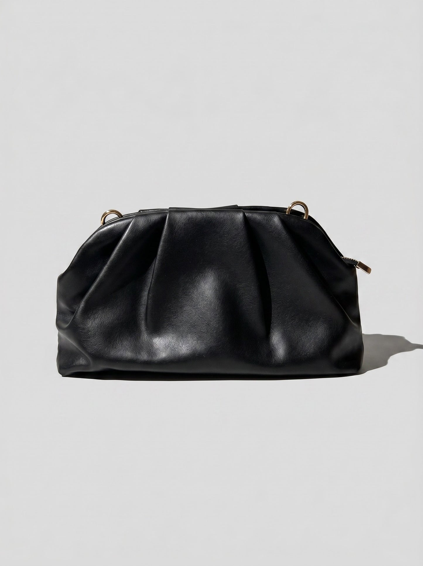 Black braided clutch bag