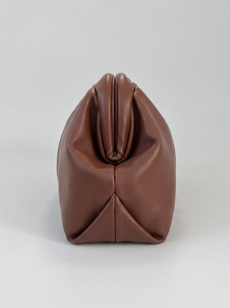 Brown braided clutch bag