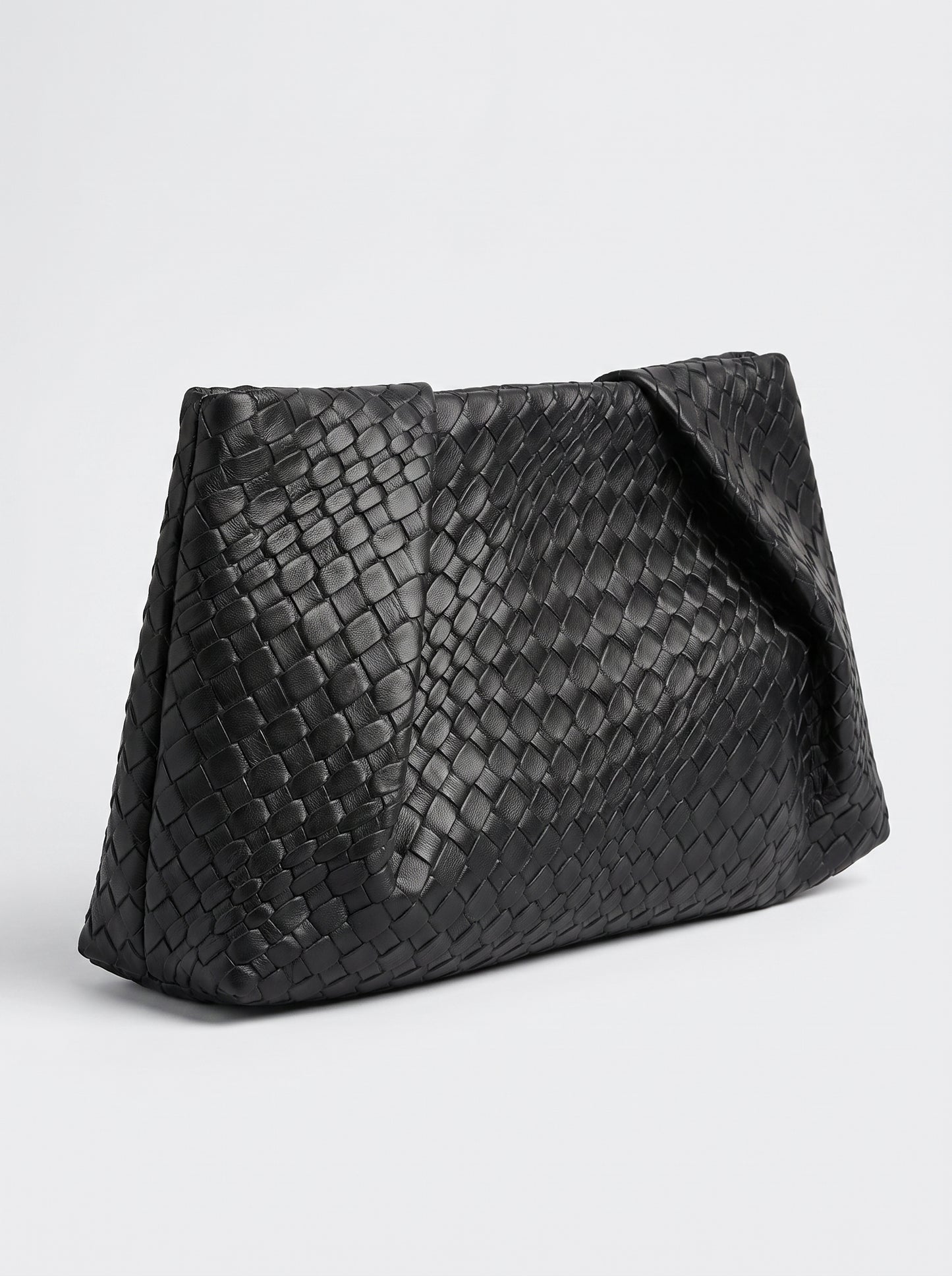Black braided clutch bag