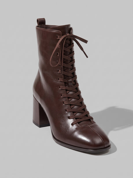 Novara Dark Brown - מגפון עור בחום כהה עם שרוכים בחזית, רוכסן צד, חרטום מעוגל ועקב בלוק.