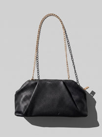 Black braided clutch bag