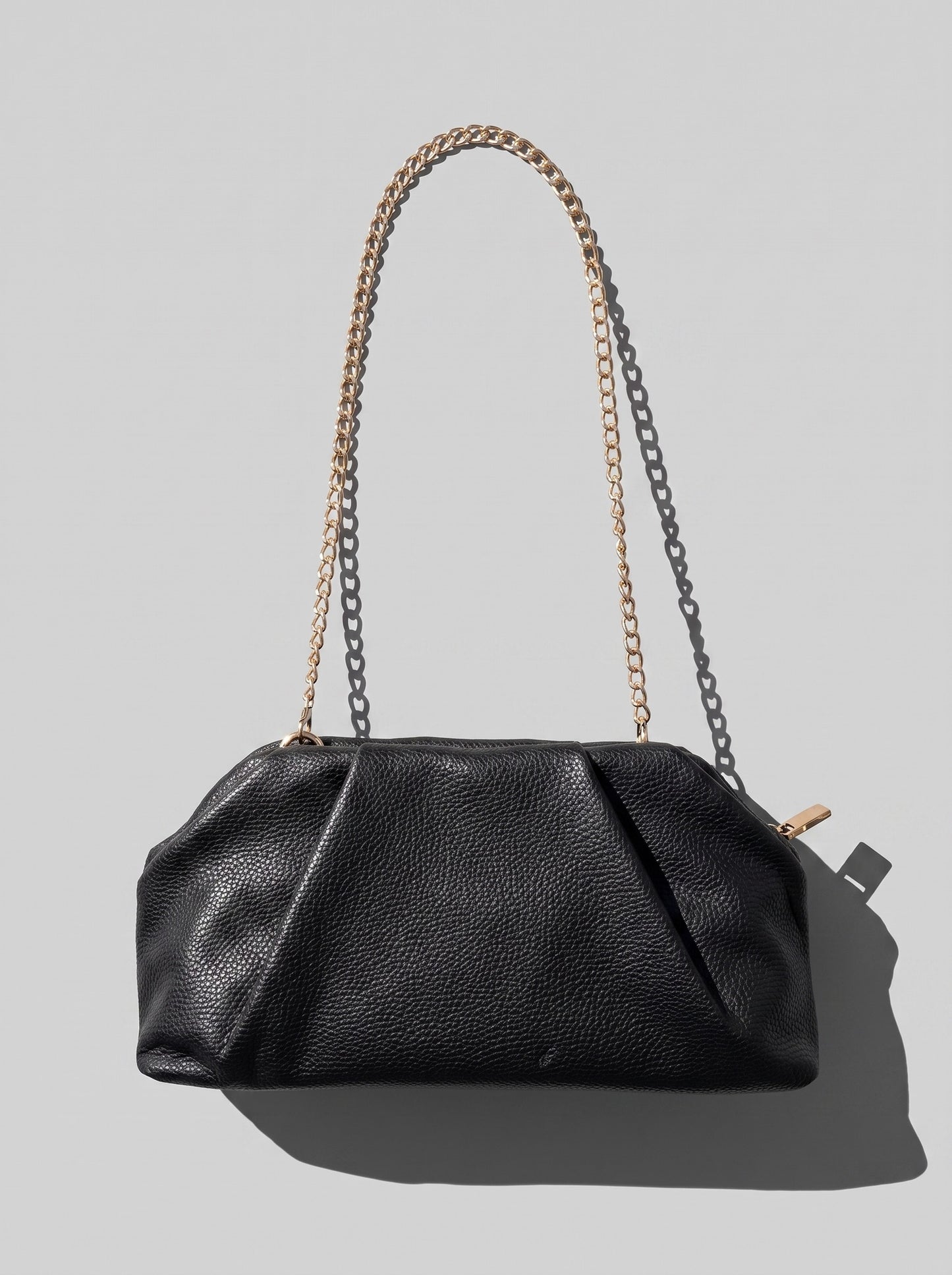 Black braided clutch bag