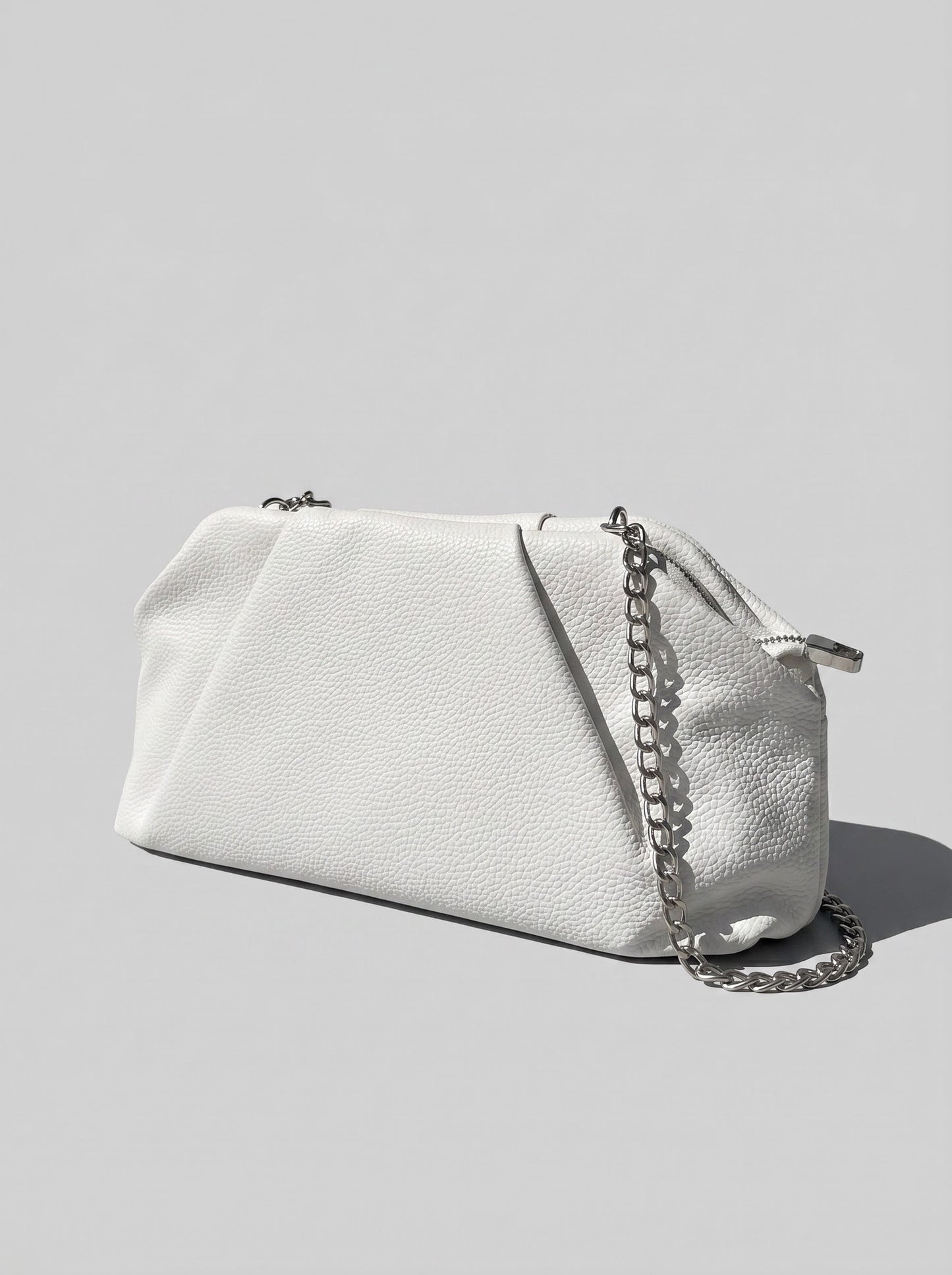 Black braided clutch bag