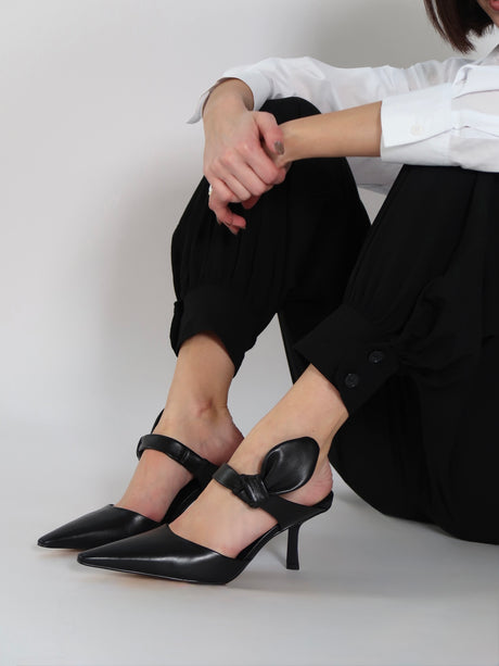 Capsule - Adrian Black