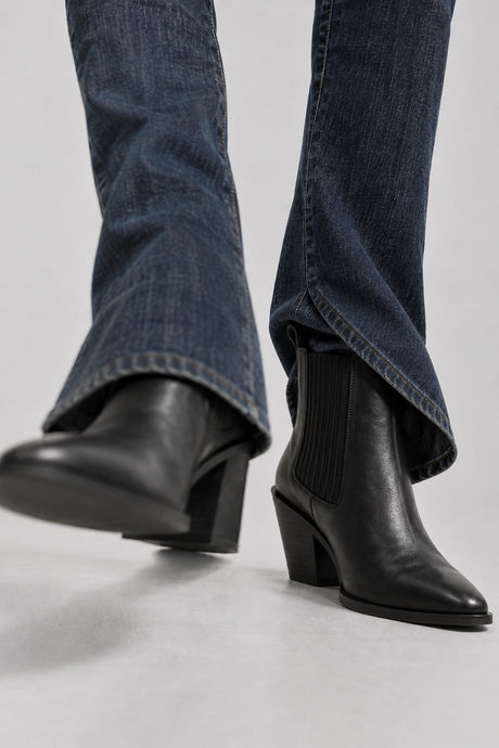 Firenze Black boots with dark denim tucked behind the shaft